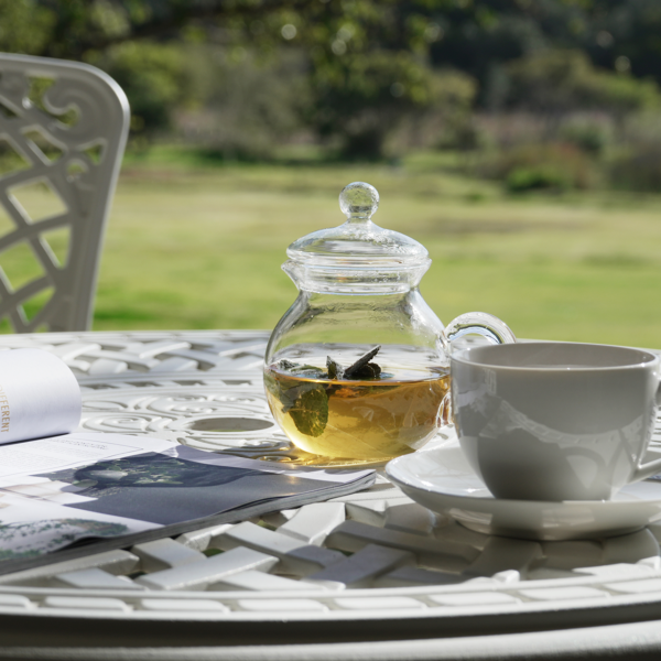 herbal tea with cup and saucer on a table at Kwendalo Wellness Centre